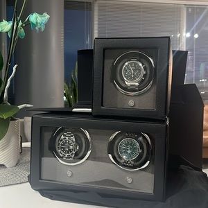 Wolf Watch Winders. With receipts original boxes and time left on warranty.